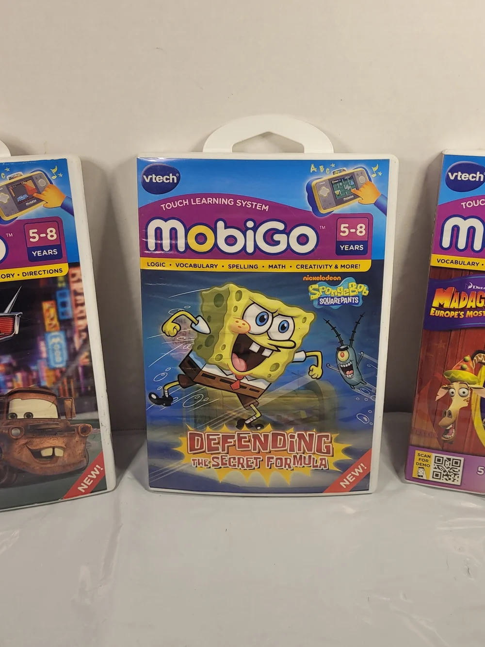 Lot Of 3 MobiGo Vtech Games Cars SpongeBob Madagascar (U)